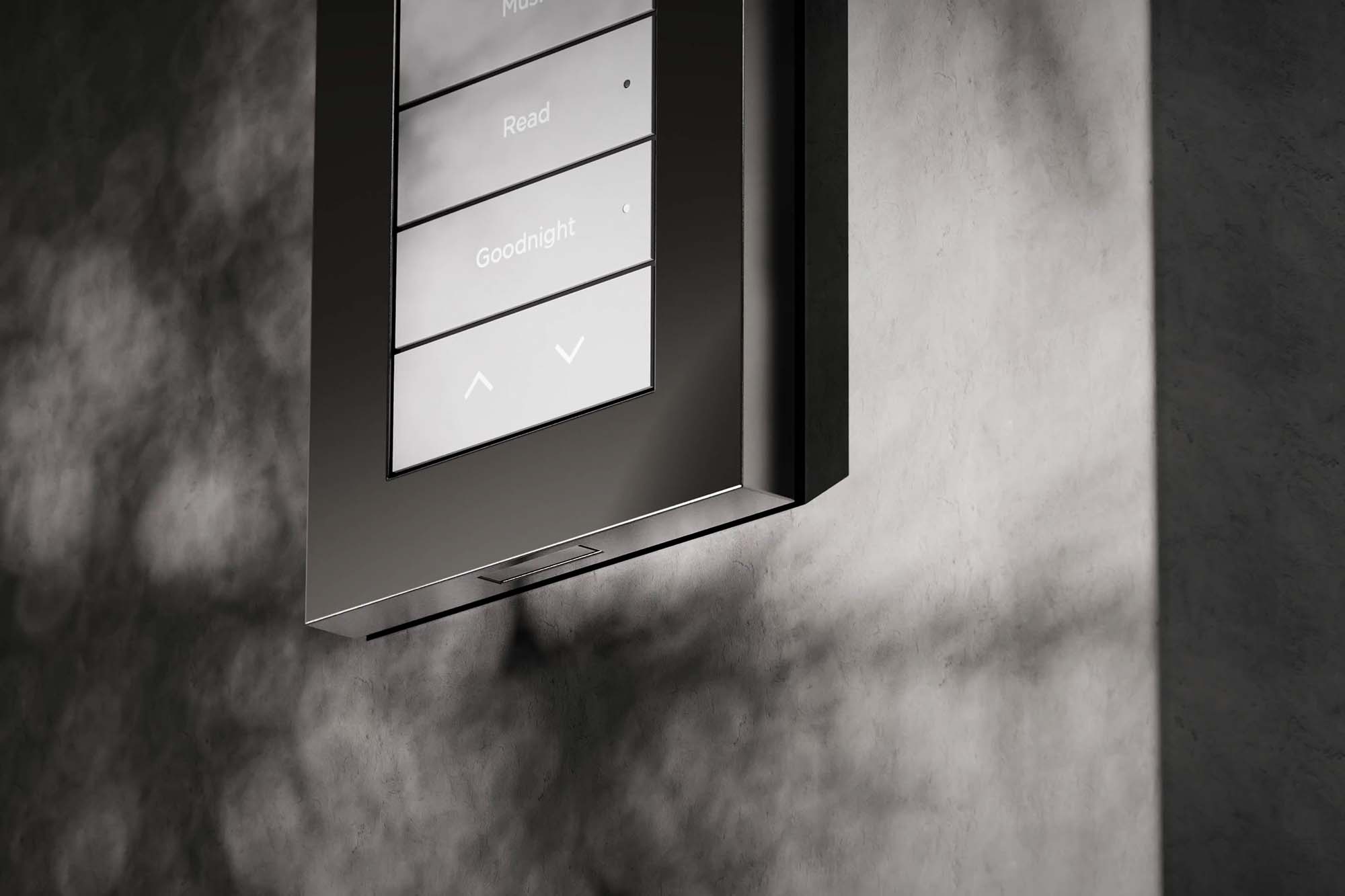 Control4 Lux Keypad closeup on the wall with silver and grey