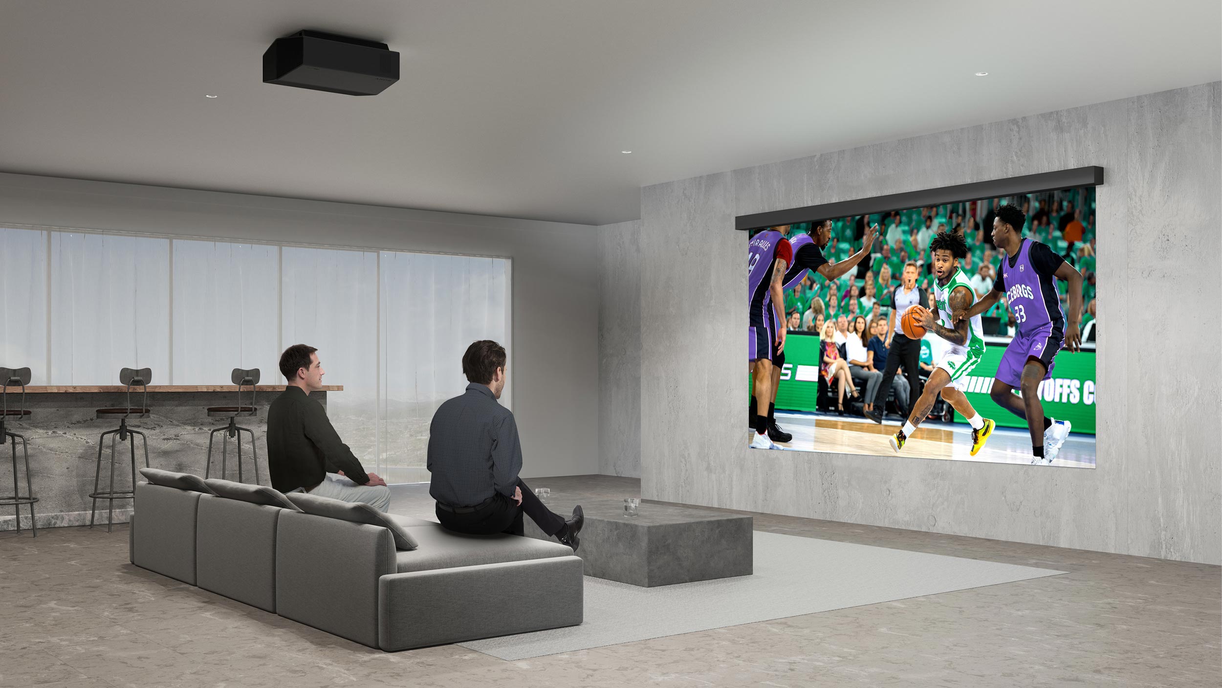 A spacious room with a ceiling projector showcasing a basketball game on a large retractable screen.